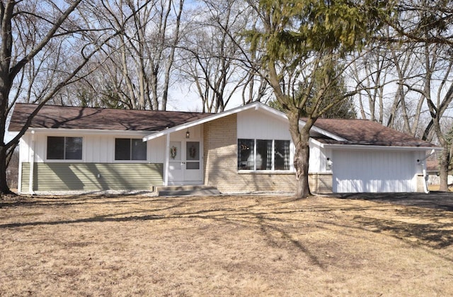 ranch-style home with brick siding and a front lawn