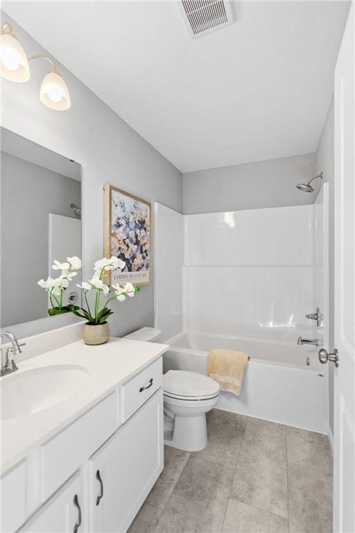 full bathroom featuring visible vents, toilet, shower / bathing tub combination, tile patterned floors, and vanity