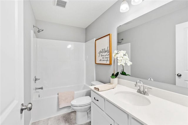 full bathroom with bathtub / shower combination, toilet, vanity, and visible vents