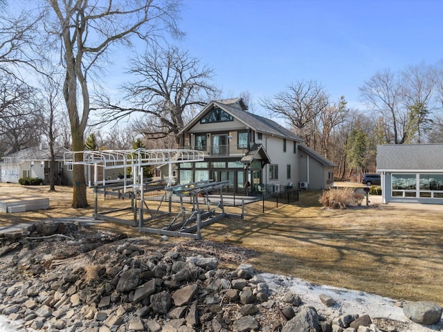 rear view of house with a balcony