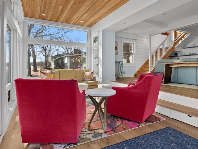 sunroom with a wealth of natural light and wooden ceiling