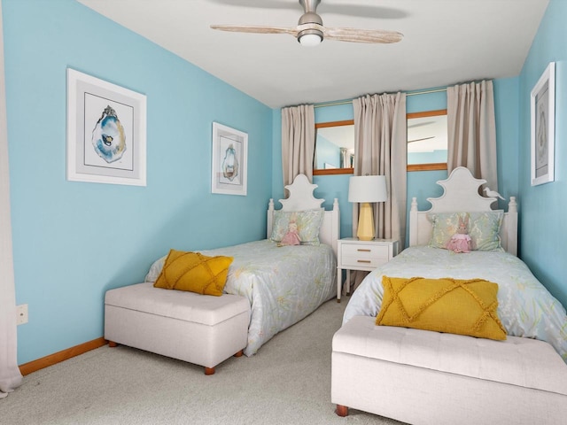 bedroom with carpet flooring, ceiling fan, and baseboards