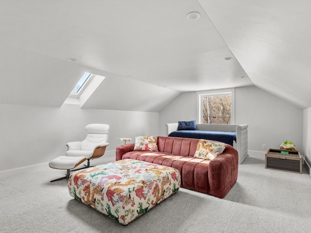 carpeted bedroom with baseboards and vaulted ceiling