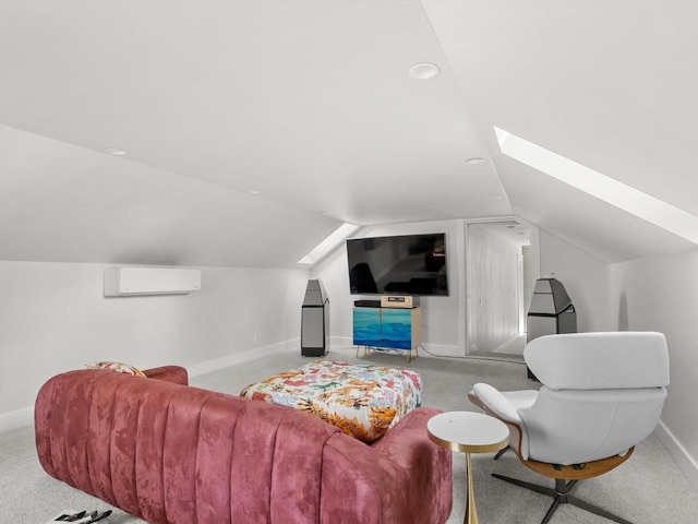 living room featuring a wall unit AC, vaulted ceiling with skylight, carpet flooring, and baseboards