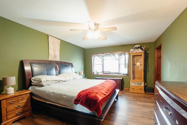 bedroom featuring ceiling fan and wood finished floors