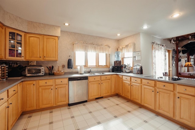 kitchen featuring a toaster, light floors, recessed lighting, black electric cooktop, and stainless steel dishwasher