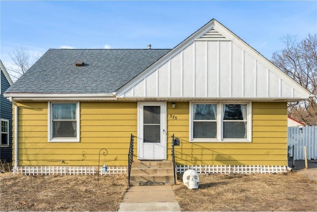 bungalow-style house featuring crawl space, board and batten siding, a shingled roof, and entry steps