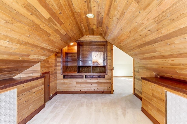 bonus room featuring wood ceiling, wood walls, and vaulted ceiling