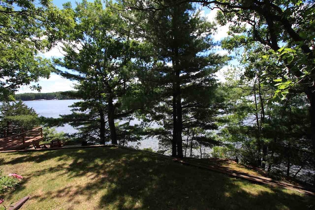 view of yard with a water view