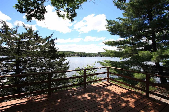 deck featuring a water view