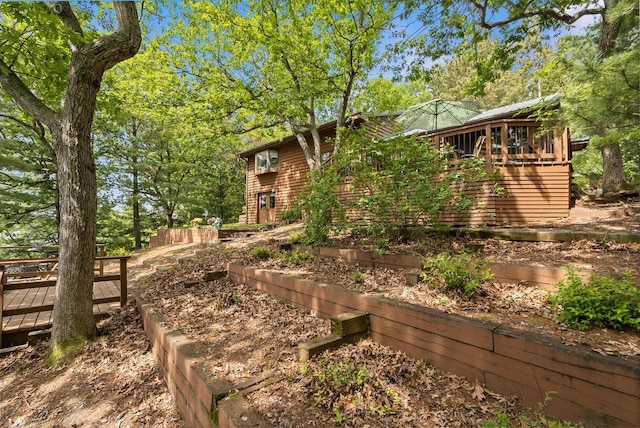 view of yard featuring a wooden deck