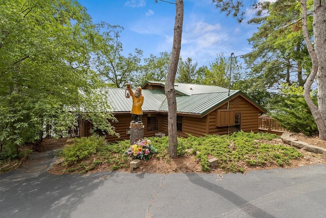 view of front of property featuring metal roof