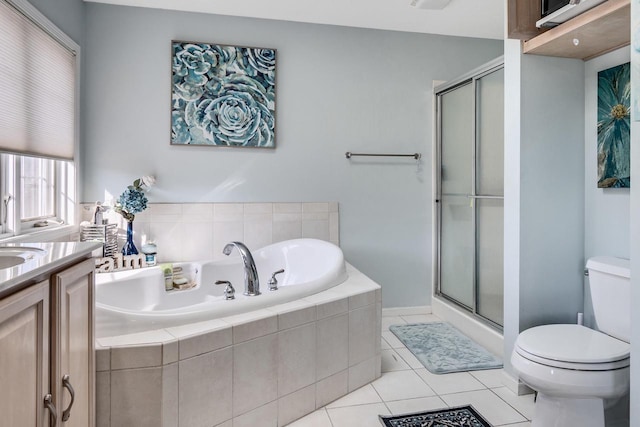 bathroom with tile patterned floors, a shower stall, toilet, and a bath