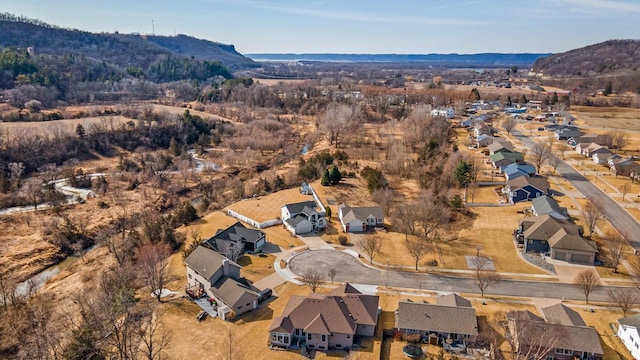 aerial view featuring a mountain view and a residential view