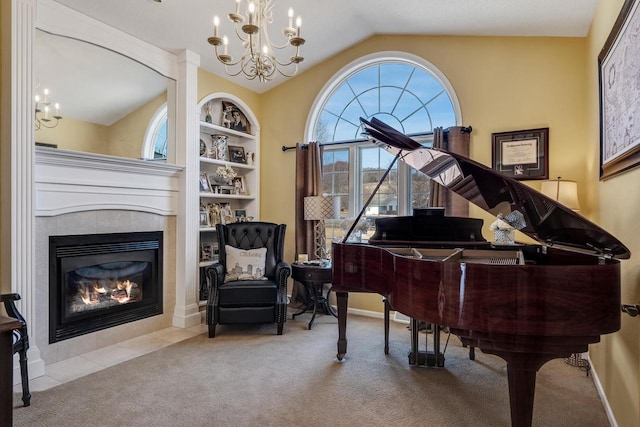 living area with carpet floors, lofted ceiling, built in shelves, and an inviting chandelier