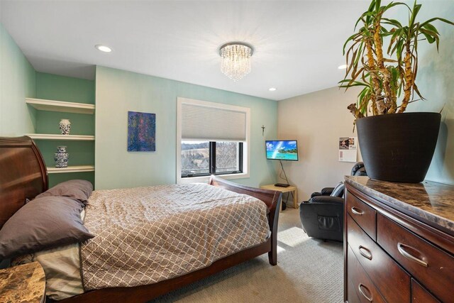 bedroom featuring recessed lighting and light carpet