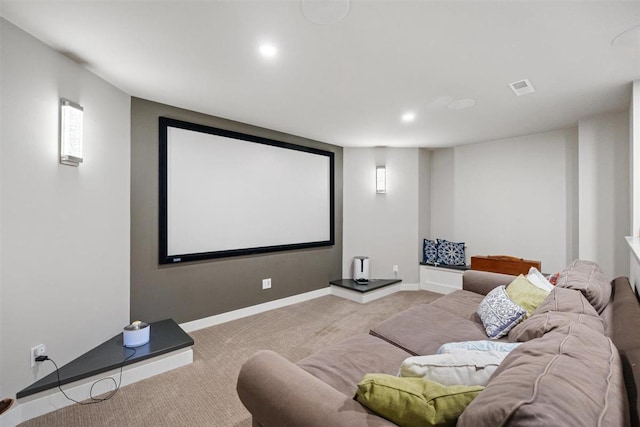 carpeted home theater room featuring recessed lighting, visible vents, and baseboards