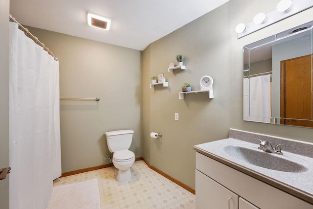 bathroom featuring visible vents, baseboards, toilet, tile patterned floors, and vanity