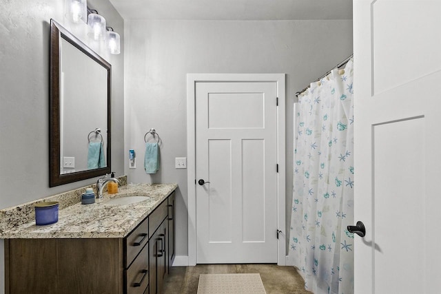 full bathroom featuring vanity and a shower with shower curtain