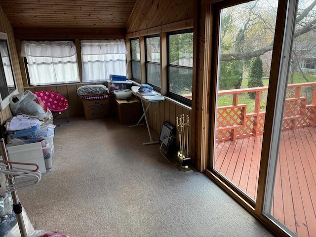 sunroom / solarium with wooden ceiling and vaulted ceiling