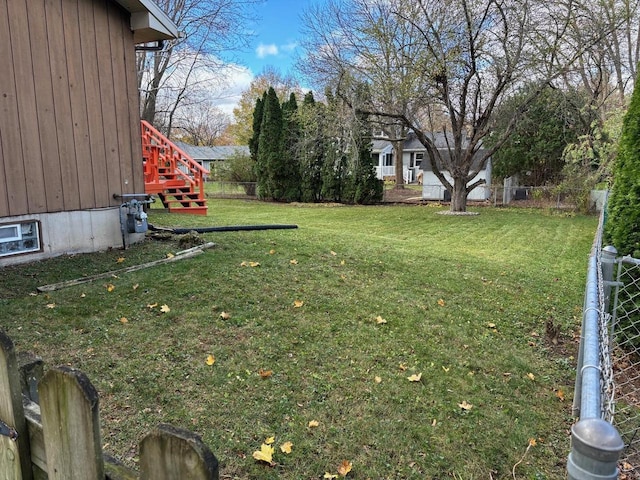 view of yard with a fenced backyard