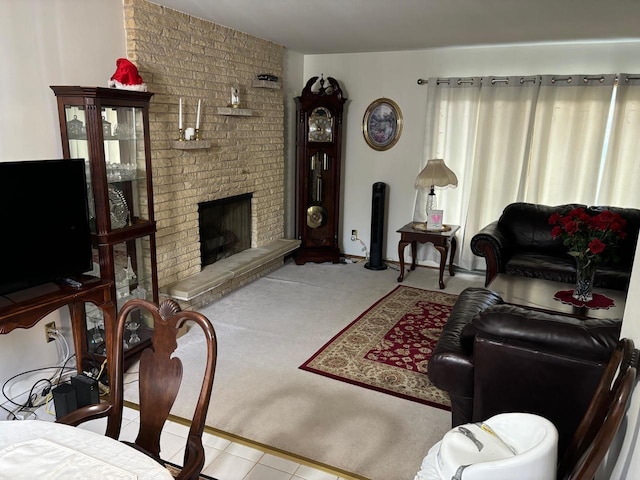 carpeted living room featuring a fireplace