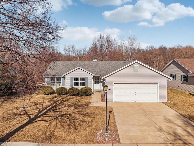 ranch-style house featuring driveway, a shingled roof, and a garage