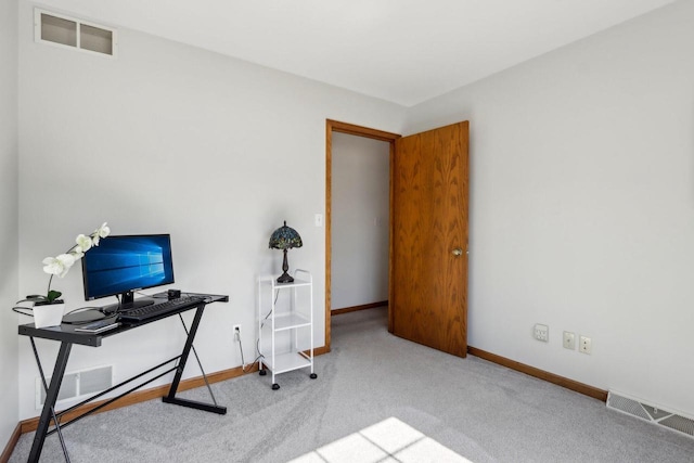 office with carpet, baseboards, and visible vents