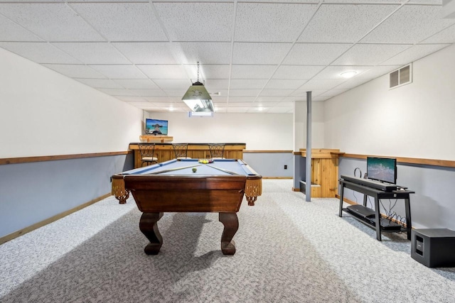 game room with a drop ceiling, baseboards, visible vents, and carpet floors