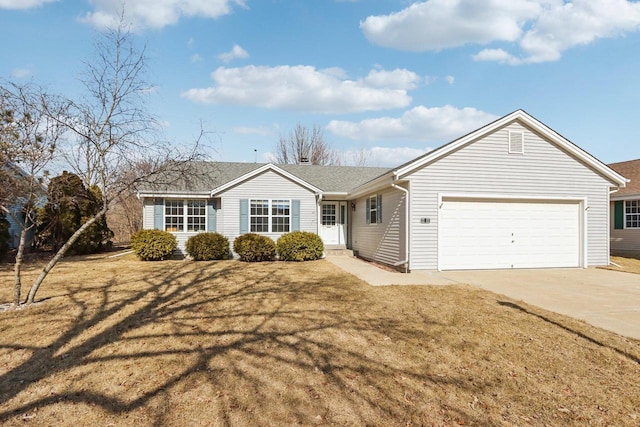 ranch-style home with a garage, a front yard, and driveway