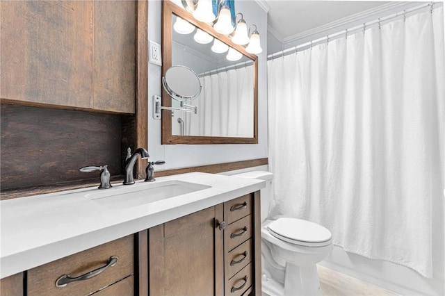 bathroom featuring shower / bath combo with shower curtain, toilet, vanity, and ornamental molding