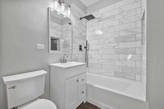 full bath with bathing tub / shower combination, toilet, and vanity