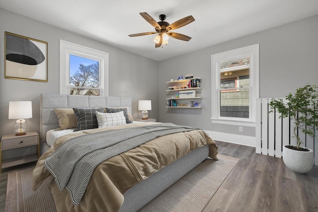 bedroom featuring ceiling fan and wood finished floors