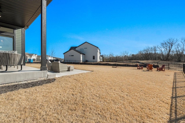 view of yard featuring a patio area and fence