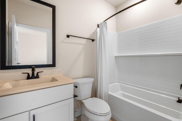 bathroom with vanity, toilet, and shower / tub combo with curtain