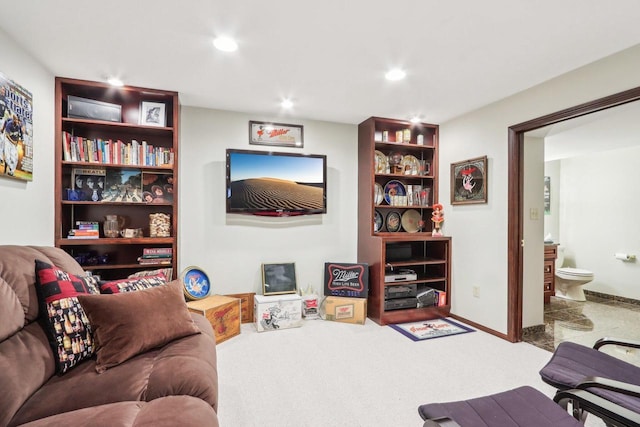 carpeted living room featuring recessed lighting and baseboards