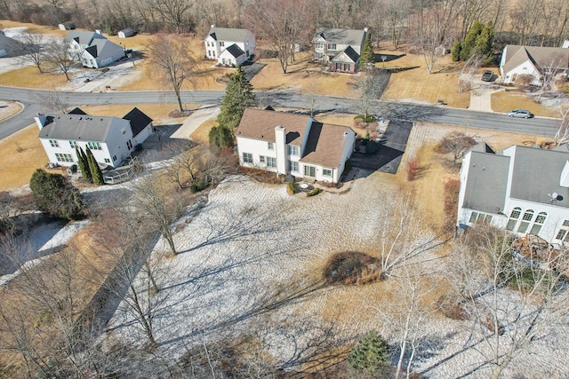 birds eye view of property with a residential view