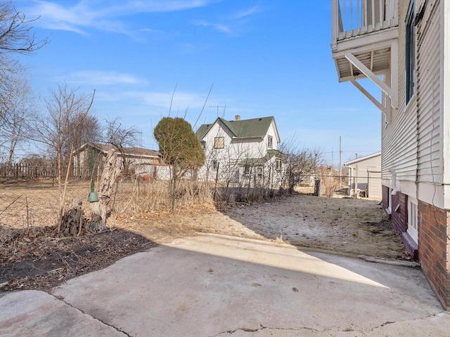 view of yard with a patio and fence