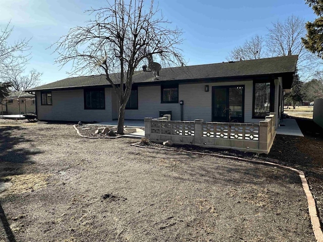 back of property featuring a patio area