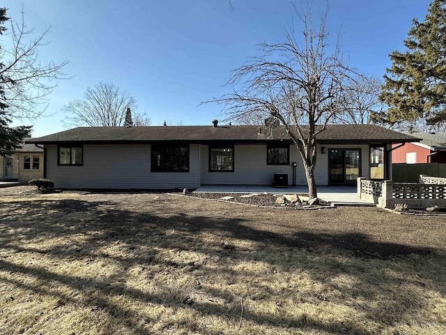 rear view of property featuring a patio area