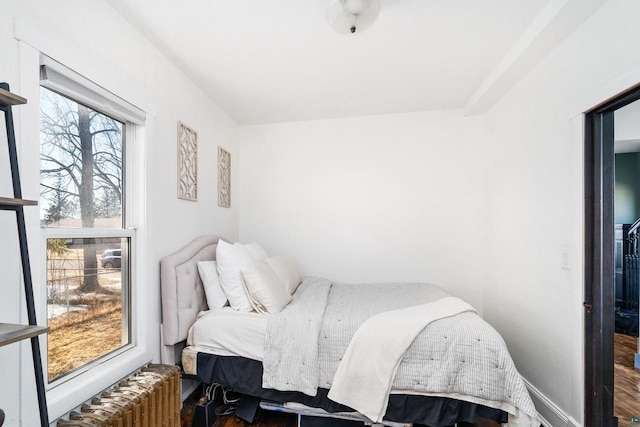 bedroom with radiator heating unit