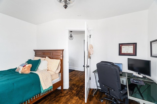 bedroom with wood finished floors