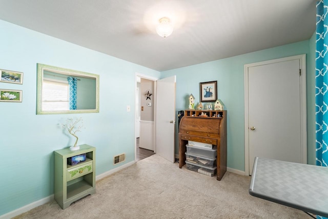 interior space featuring visible vents and baseboards