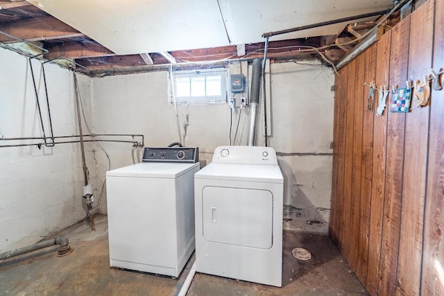 clothes washing area with laundry area and washer and clothes dryer