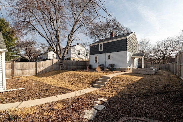 view of yard featuring a fenced backyard