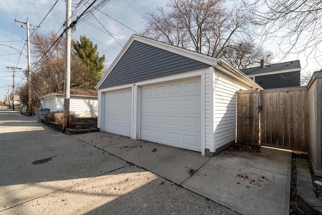 detached garage with fence