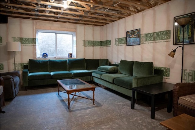 living area featuring concrete flooring