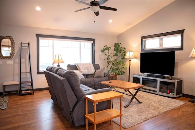 living area featuring recessed lighting, baseboards, wood finished floors, and vaulted ceiling