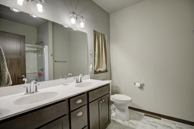 full bath featuring toilet, visible vents, a shower with shower door, and a sink