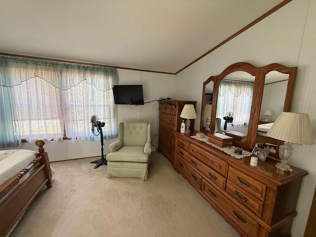 bedroom featuring light colored carpet, ornamental molding, and vaulted ceiling